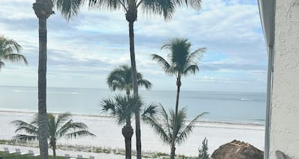 ON THE BEACH AT THE SOFT WHITE SAND