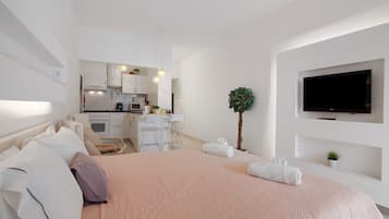 Een strijkplank/strijkijzer, wifi, beddengoed