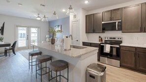 Fridge, dining tables - Landing | Spectacular 1BD in Corinth (Denton)