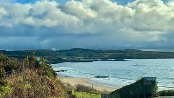 Espreguiçadeiras, toalhas de praia