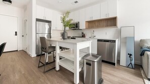 Fridge, dining tables - Landing | Modern 1BD, Gym, Clubhouse (Alexandria)