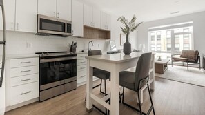 Fridge, dining tables - Landing | Modern 1BD, Gym, Clubhouse (Alexandria)