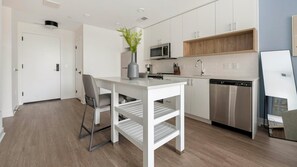 Fridge, dining tables - Landing | Amazing 1BD, Clubhouse, Courtyard (Alexandria)