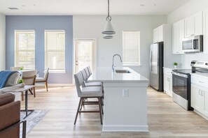 Fridge, dining tables - Landing | Chic 3BD, Pool, Yoga Studio (Orange Beach)