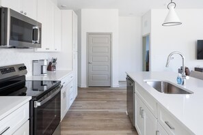 Fridge, dining tables - Landing | Stylish 3BD, Yoga Studio, Gym (Orange Beach)