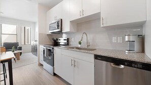 Fridge, dining tables - Landing | Chic Studio, Pool, Gym (Austin)