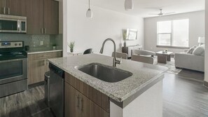 Fridge, dining tables - Landing | Modern 1BD, Gym (Houston)