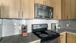 Fridge, dining tables - Landing | Modern 1BD, Gym (Houston)