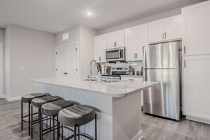 Fridge, dining tables - Landing | Spectacular 2BD, Pool (Tice)