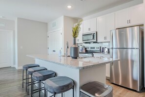 Fridge, dining tables - Landing | Stylish 2BD, Pool (Tice)