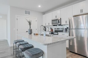Fridge, dining tables - Landing | Stylish 2BD, Pool (Tice)