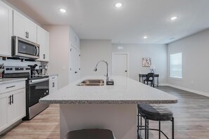 Fridge, dining tables - Landing | Stunning 2BD, Pool (Tice)