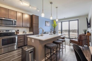 Fridge, dining tables - Landing | Chic 1BD, Gym, Courtyard (Milwaukee)