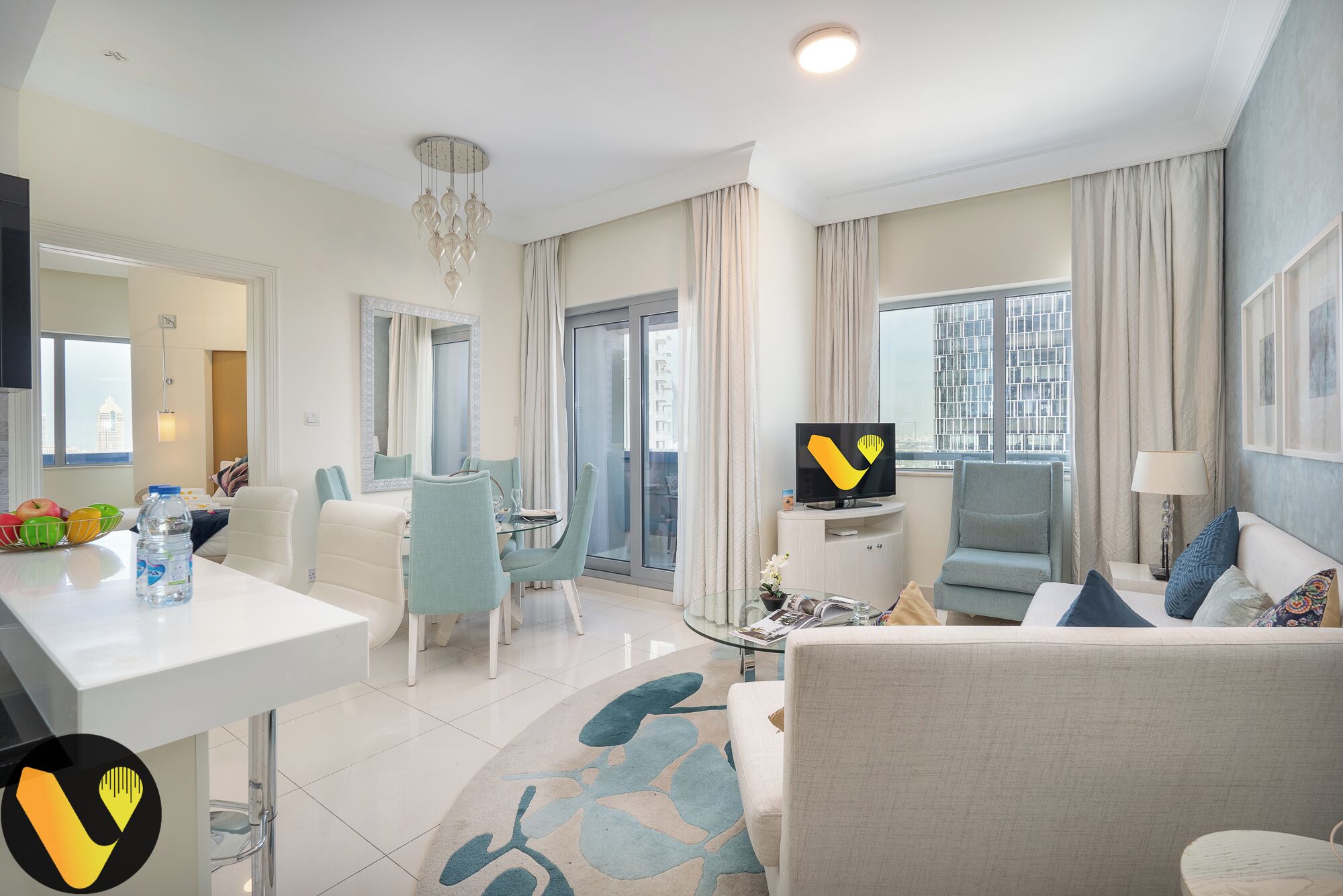 Apartment, Balcony, City View | Living area | 65-inch Smart TV with cable channels