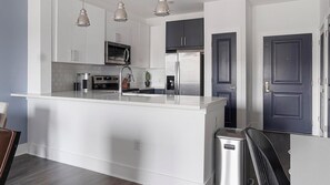 Fridge, dining tables - Landing | Incredible 1BD, Clubhouse, Game Room (Lawrenceville)