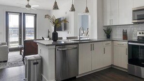 Fridge, dining tables - Landing | Amazing 2BD, Yoga Studio, Pool (Lawrenceville)