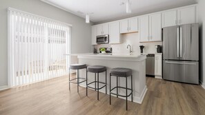 Fridge, dining tables - Landing | Stunning 2BD, Gym, Courtyard (Charlotte)
