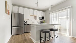 Fridge, dining tables - Landing | Modern 1BD, Gym, Courtyard (Charlotte)