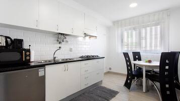 Fridge, microwave, stovetop, electric kettle