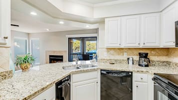 Coffee/tea maker, fridge, microwave, oven