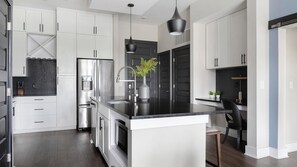 Fridge, dining tables - Landing | Modern 2BD, Gym, Courtyard (Decatur)