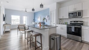 Fridge, dining tables - Landing | Chic 1BD, Gym, Pool (Leander)