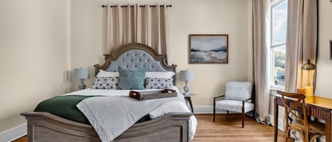 1 bedroom, desk, iron/ironing board, travel crib