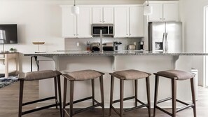 Fridge, dining tables - Landing | Beautiful 2BD, Clubhouse, Gym (Port Wentworth)