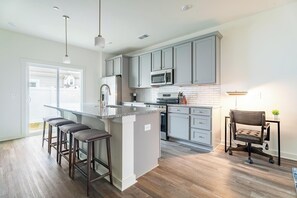 Fridge, dining tables - Landing | Beautiful 2BD, Gym, Pool (Port Wentworth)