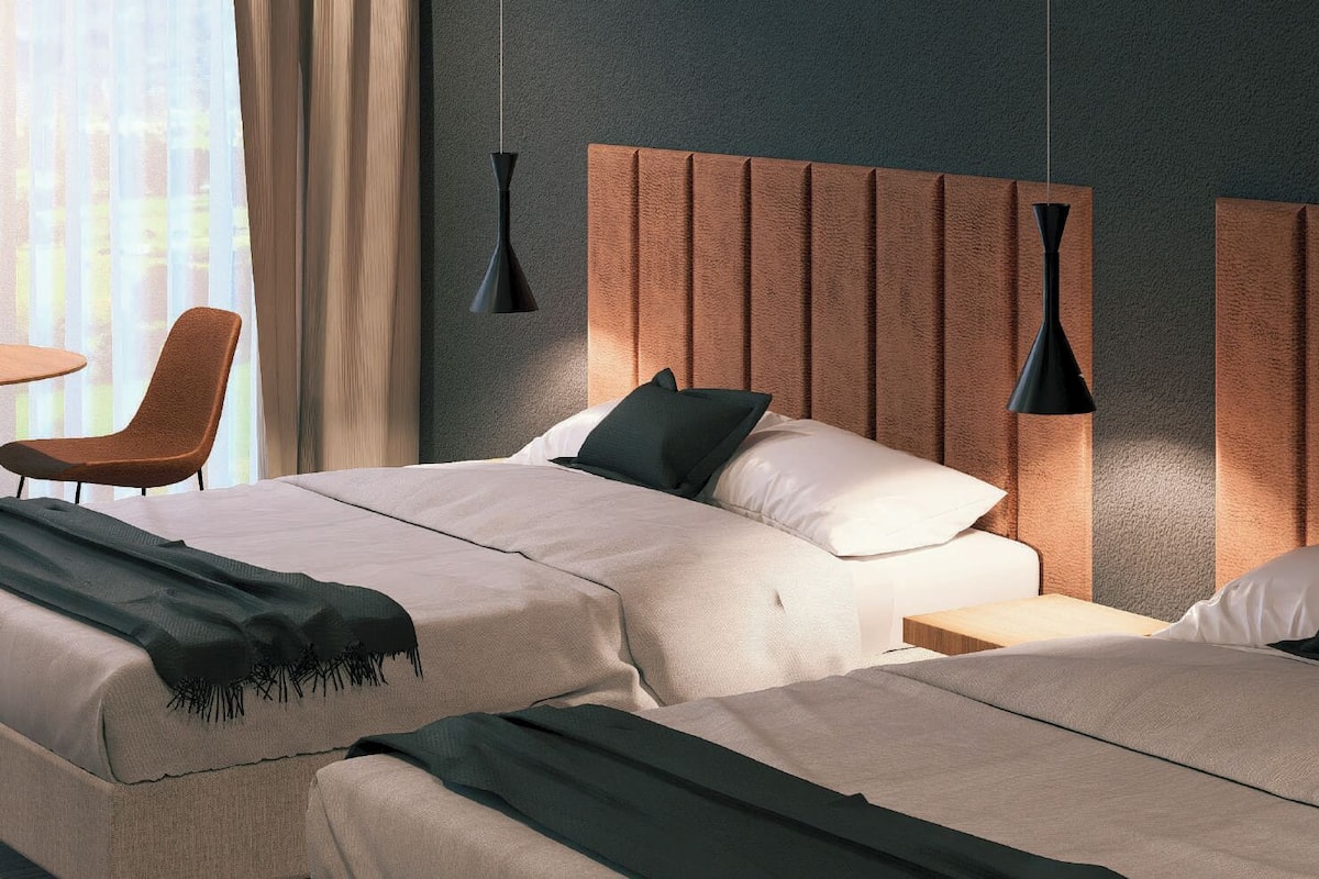 Habitación junior con 2 camas individuales | Caja de seguridad en la habitación y wifi gratis