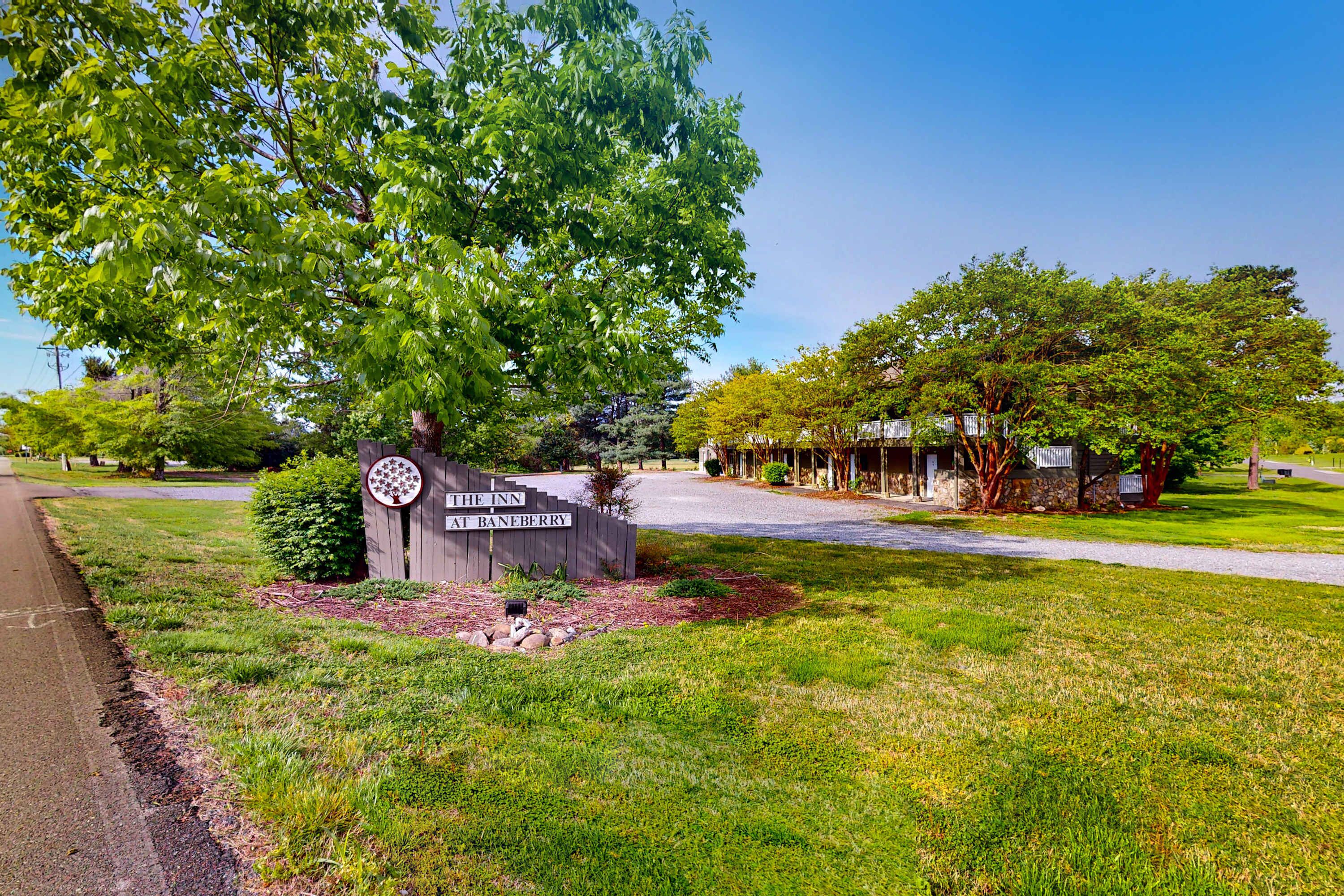 A hotel entrance with a sign reading "The Inn at Banberry."
