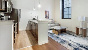 Fridge, dining tables - Landing | Stylish 1BD, Courtyard, Gym (Baltimore)