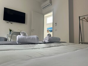 2 habitaciones, tabla de planchar con plancha, internet y ropa de cama 