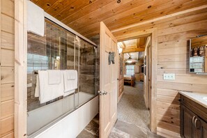 Shower, hair dryer, towels, shampoo