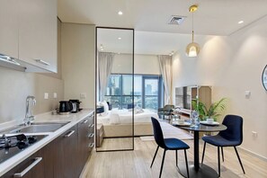 Desk, iron/ironing board, travel cot, WiFi - Upscale Studio in Park View JVC (Dubai)