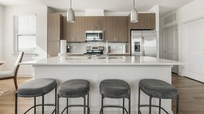 Fridge, dining tables - Landing | Beautiful 3BD, Gym, Pool (Miromar Lakes)