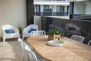 Outdoor dining - Residence Bia's Beach three-room apartment Trilo D for 5 persons (Bibione)