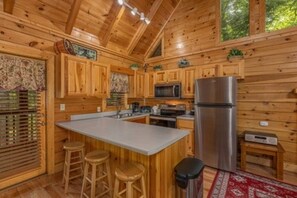 Fridge, microwave, oven, stovetop - Cozy Log Cabin, Sleeps 4, Hot Tub, Grill, Game Room (Pigeon Forge)