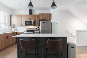 Fridge, dining table - Landing | Modern 2BD, Gym, Clubhouse (Billings)