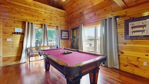 A wooden-paneled room with a pool table, a billiards table, and a framed picture on the wall. - Centrally Located Cabin, Sleeps 6・Pool Table・Views (Gatlinburg)