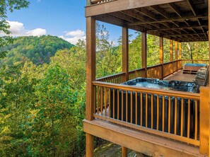 Outdoor spa tub - Large Group Cabin for 60, Two Hot Tubs , Theater and Game Room, Resort Pool (Pigeon Forge)