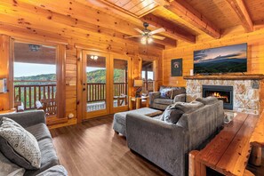TV, fireplace, DVD player, table football - Large Group Cabin for 60, Two Hot Tubs , Theater and Game Room, Resort Pool (Pigeon Forge)
