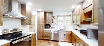 Lakefront home with amazing views, grill, fire pit, private dock, & AC