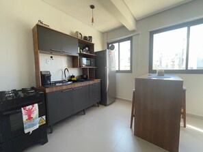 Private kitchen - Cozy apartment in Ingleses, Florianópolis. Condominium with swimming pool; (Florianópolis)