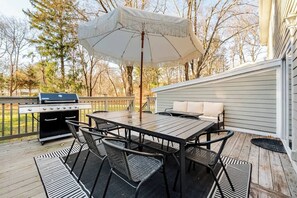 Outdoor dining - Spacious Retreat with Game Room and Fire Pit (Norwalk)