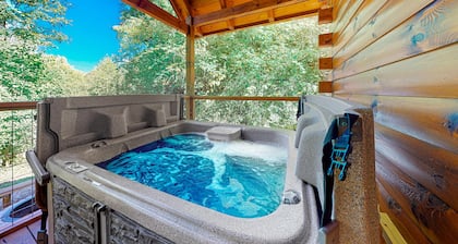 Wooded cabin w/ hot tub, fireplaces, & furnished deck