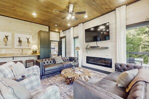 TV, fireplace, table football, offices - Spacious, Family Friendly Cabin, Pool, Games, Theater (Sevierville)