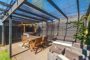 Outdoor dining - Game Room | Summer House | 3Bed Home In Stretford (Manchester)