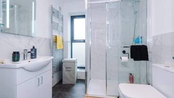 Shower, hair dryer, shampoo