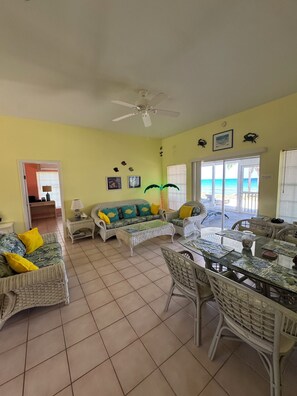 Living area - Sunset Cottage - Beautiful 2-bedroom beachfront cottage in charming Cayman Brac (West End)